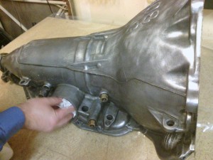 Prepping for paint by masking off the servo port.