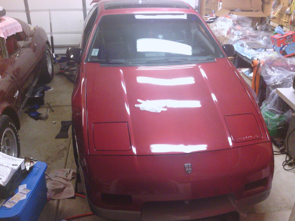 A temporary visitor to Cora's Garage...Jackie's Fiero was diagnosed with a bad fuel pump, so it was time to drop the tank and replace the in-tank fuel pump.